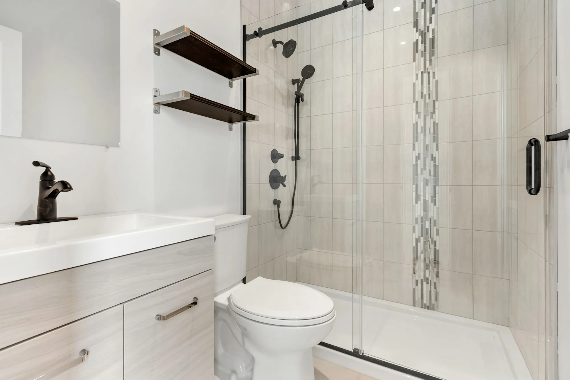 Remodeled bathroom with new tile and fixtures