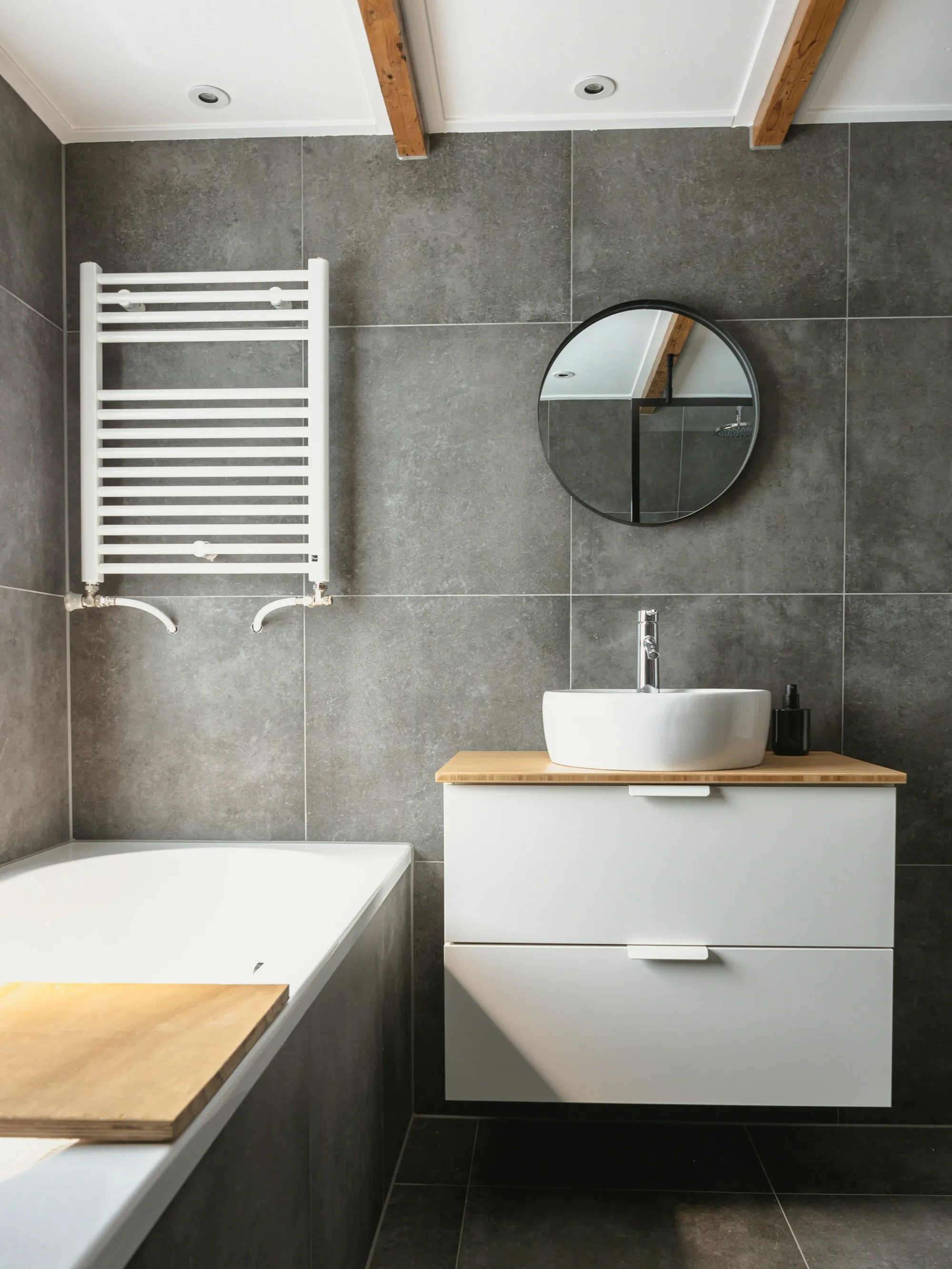 Remodeled bathroom with new tile and fixtures